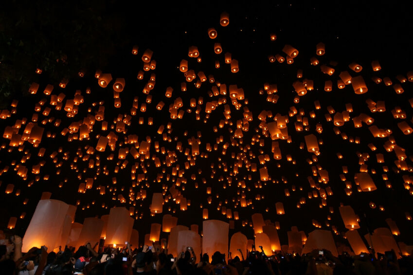 Lanterns being released into the night sky