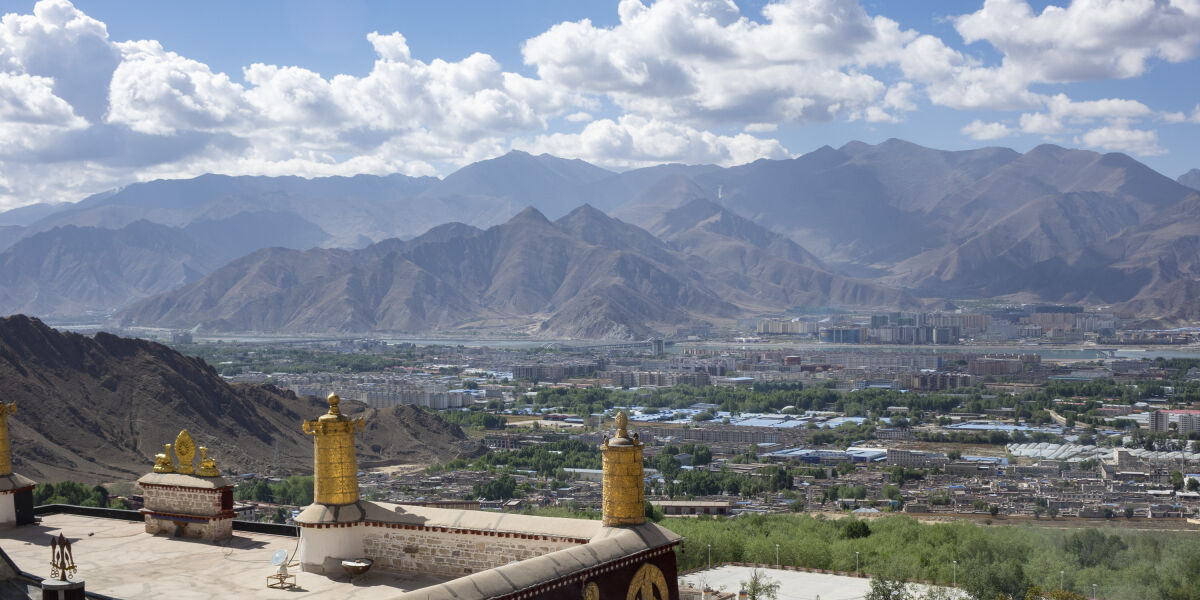 View from Ganden Palace across Lhasa, with mountains in the distance